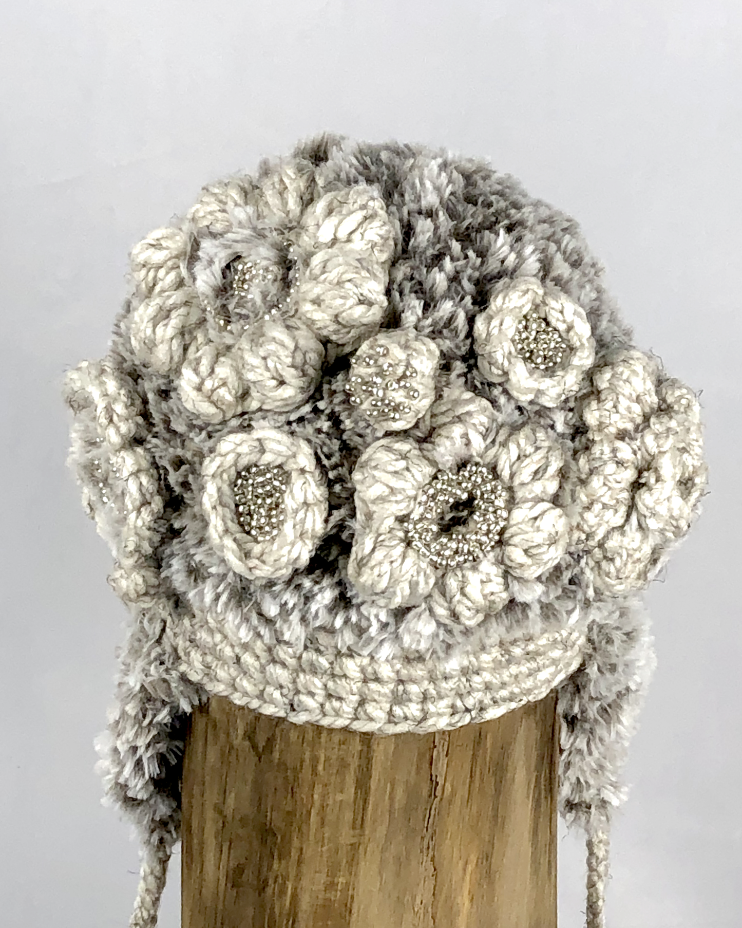 Silver Flower Flapped Toque