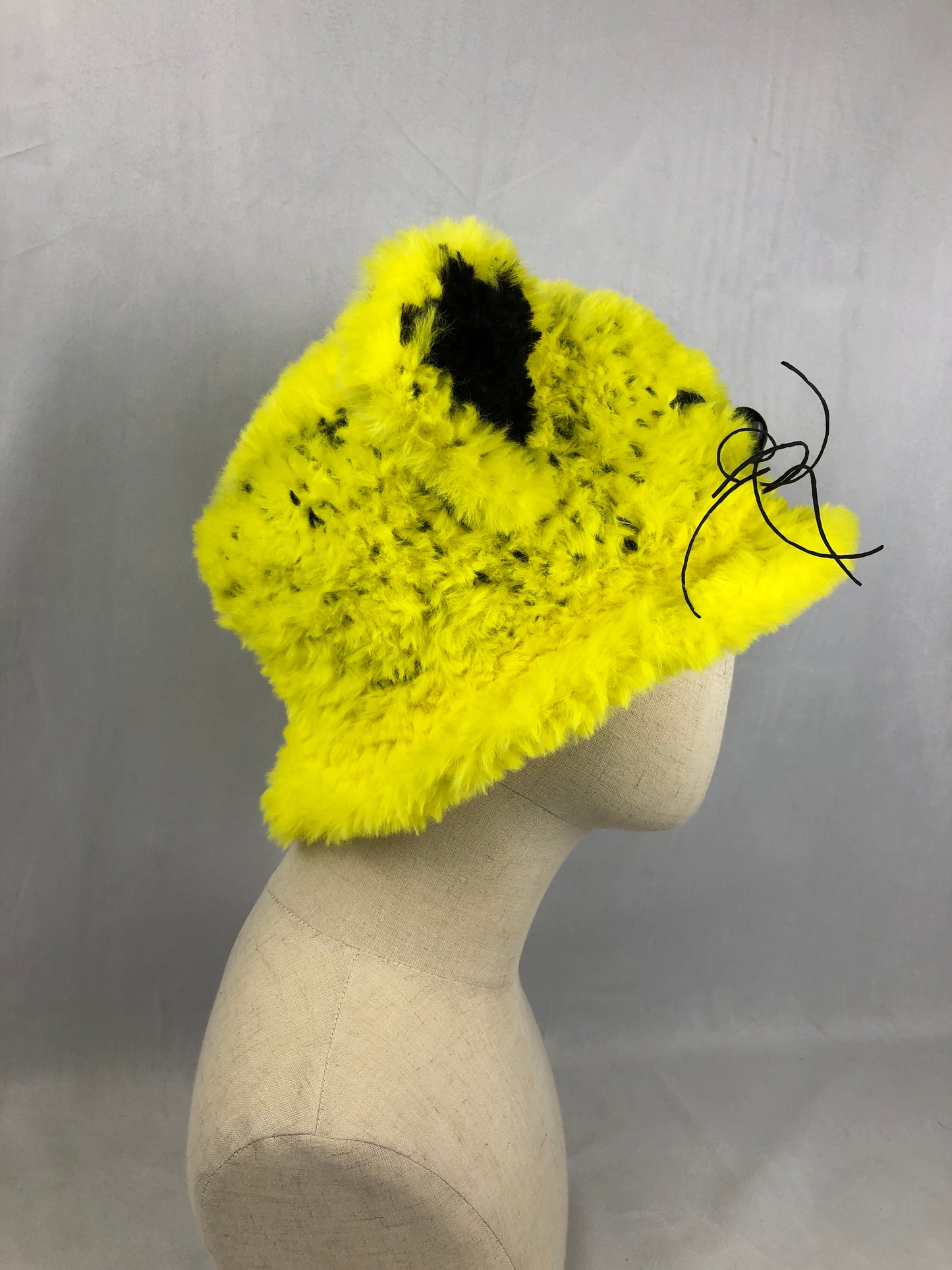 Neon yellow furry bucket cat hat