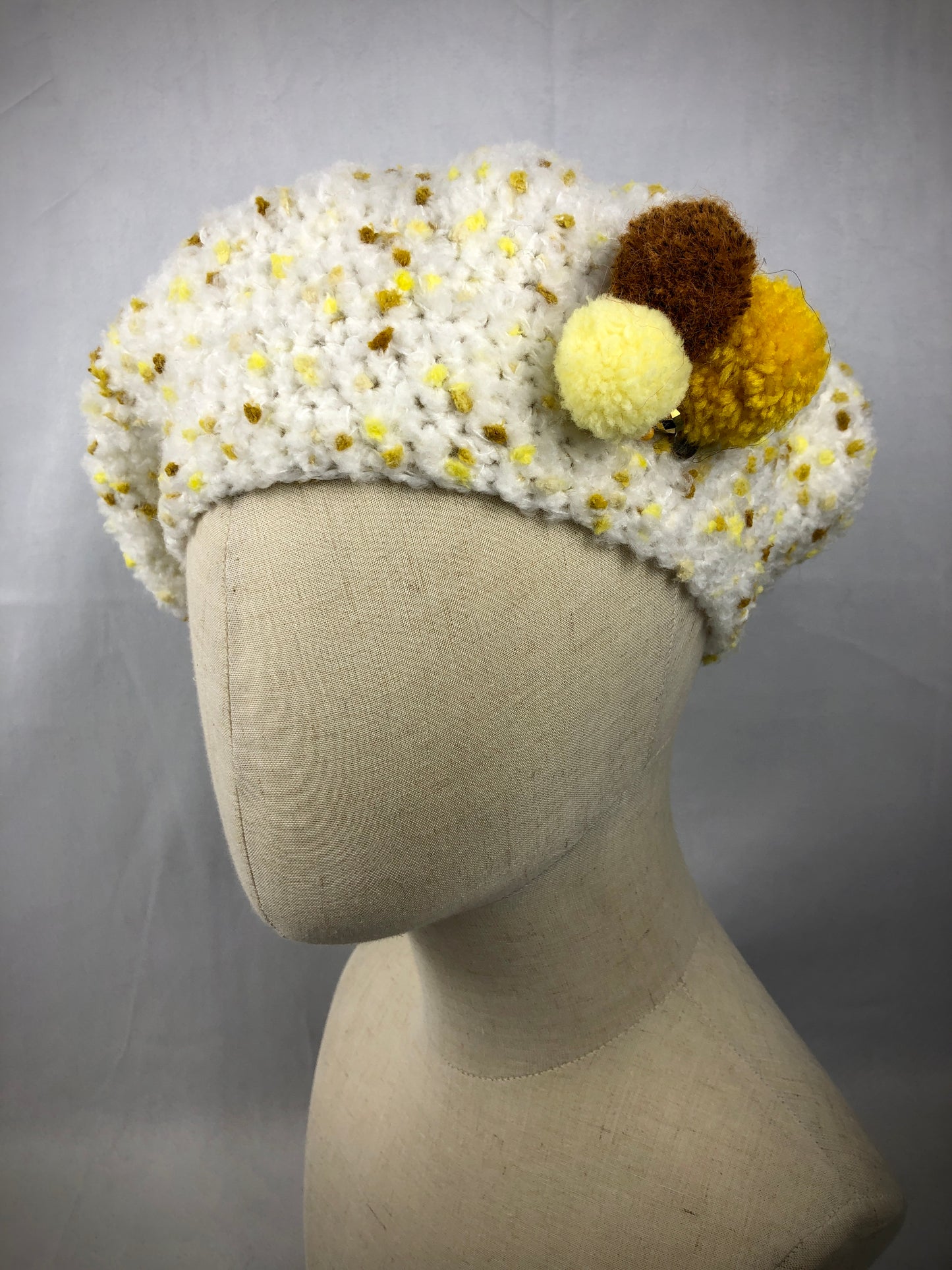 White yellow beret