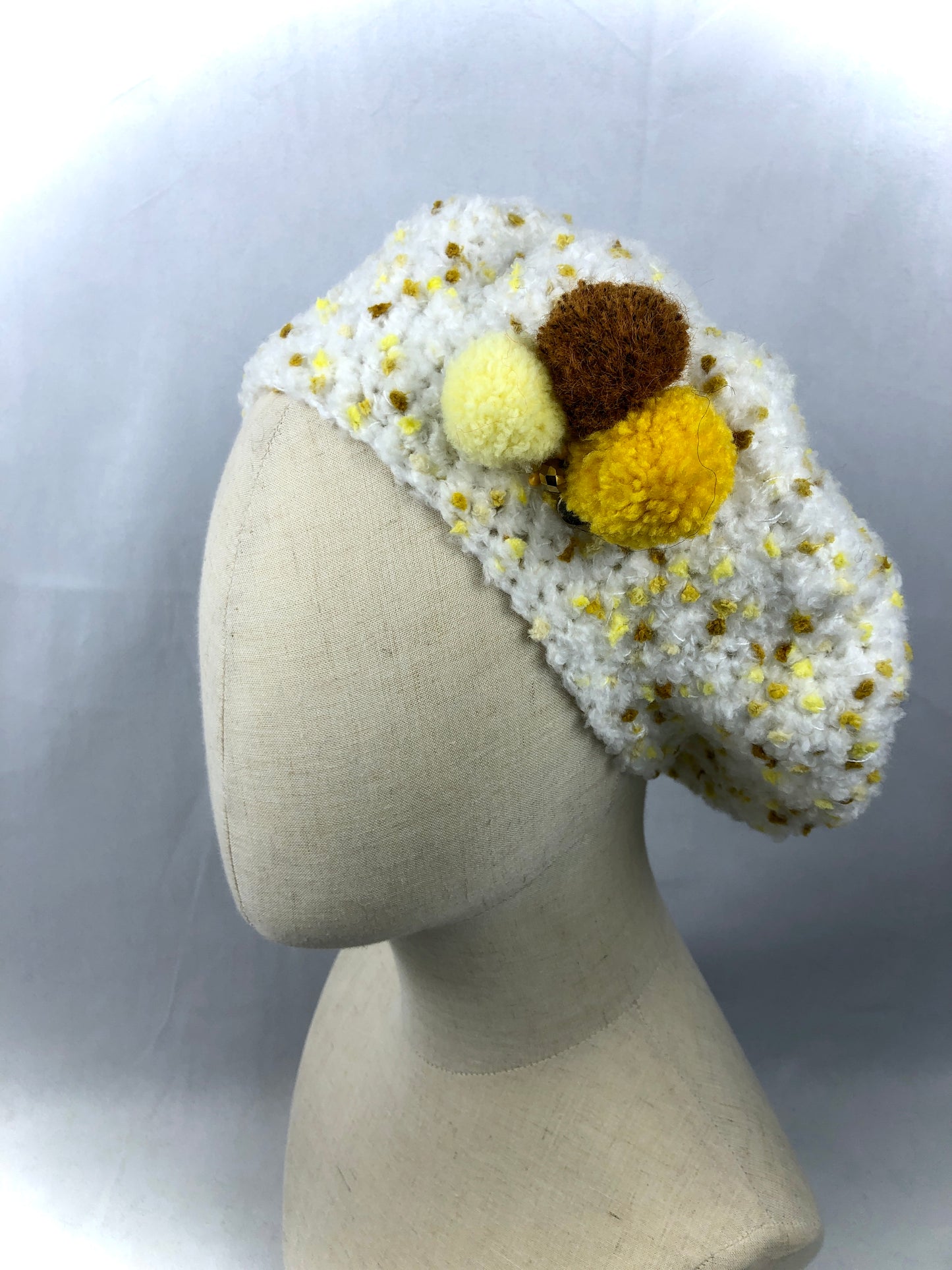 White yellow beret