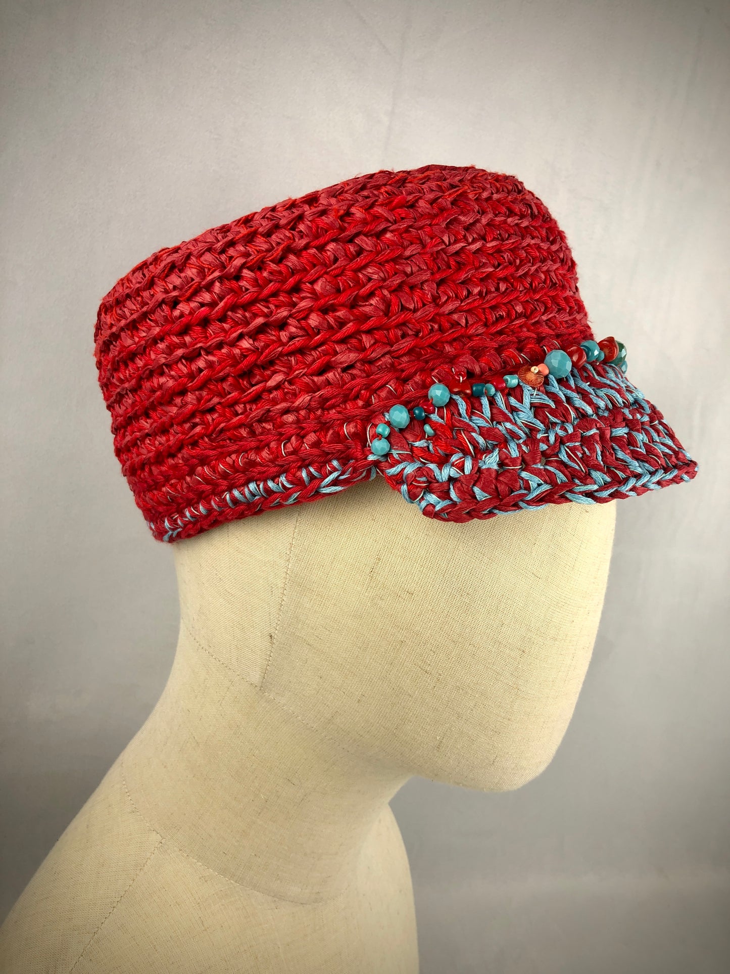 Red turquoise raffia kepi