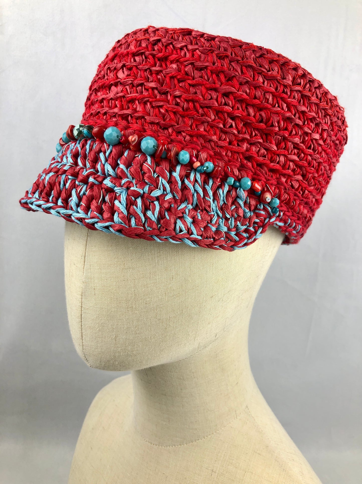 Red turquoise raffia kepi