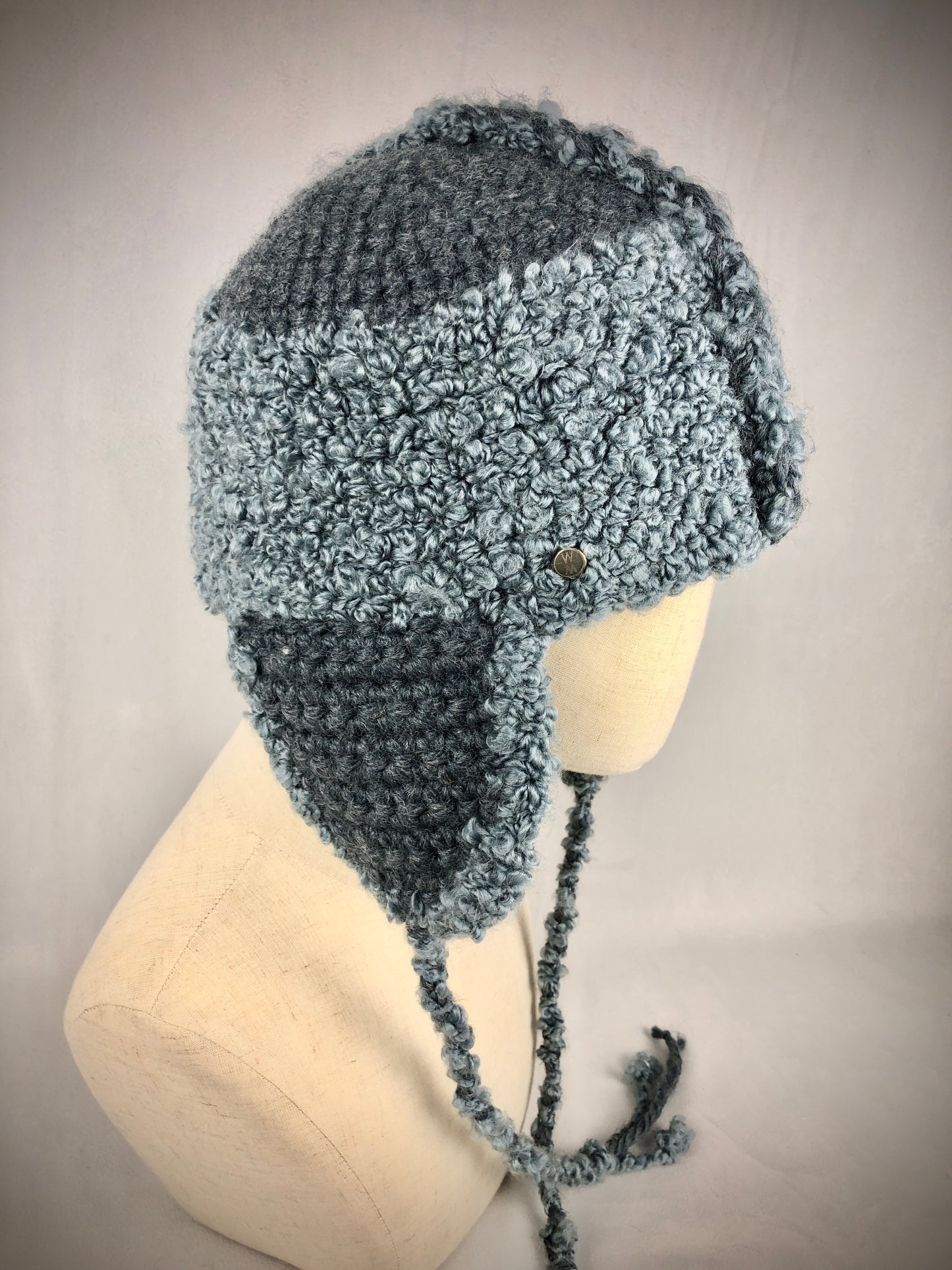 Grey blue earflap helmet hat