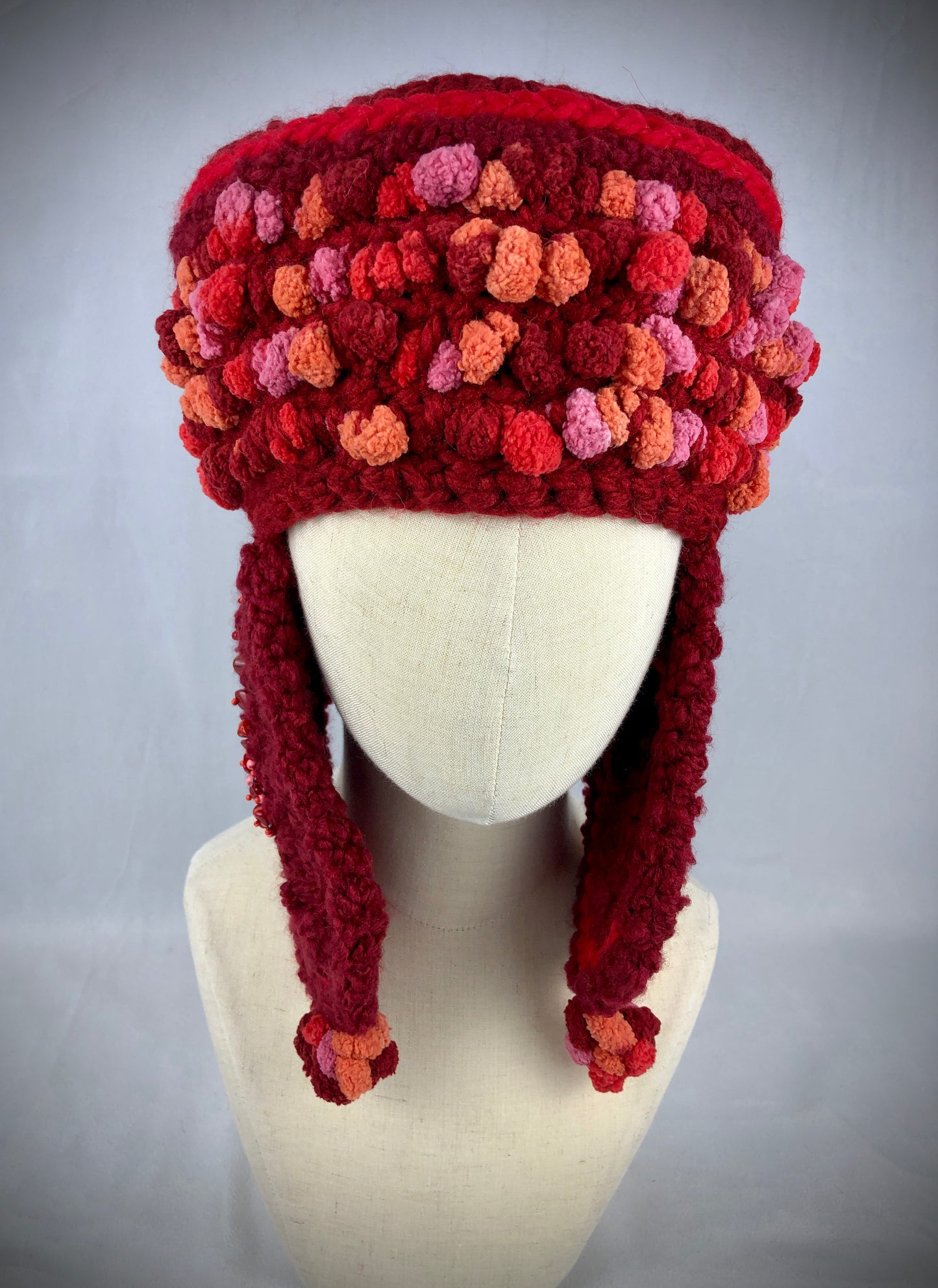 Red coral earflap hat