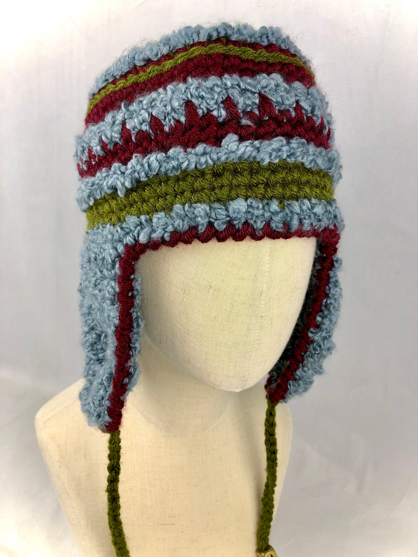 Blue green red stripe earflap hat