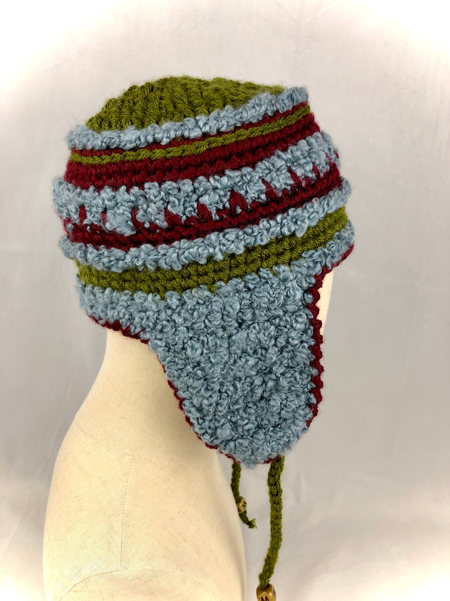 Blue green red stripe earflap hat