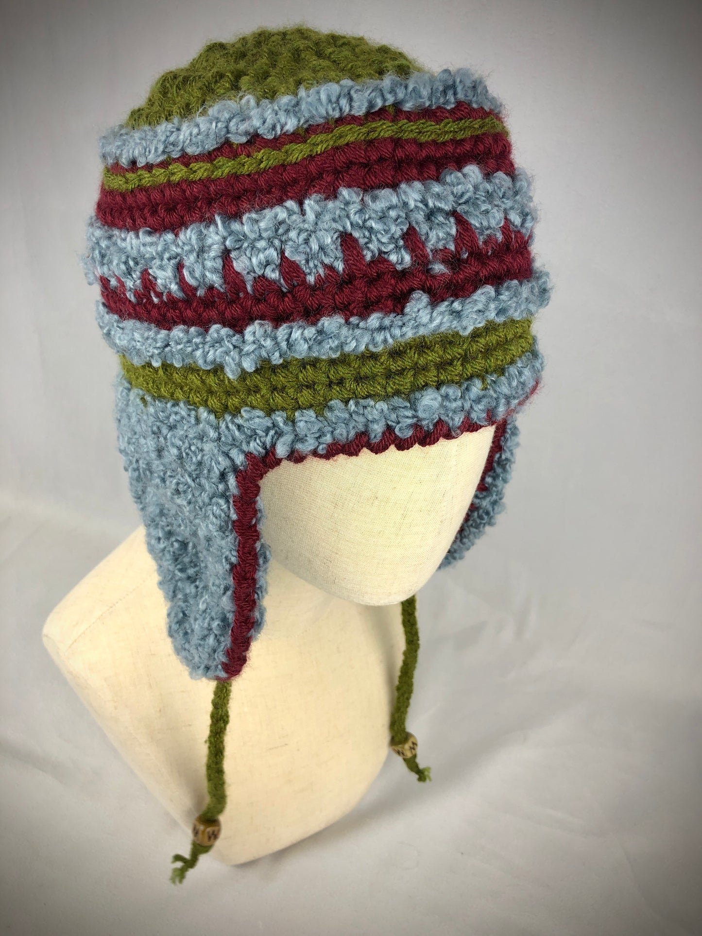 Blue green red stripe earflap hat